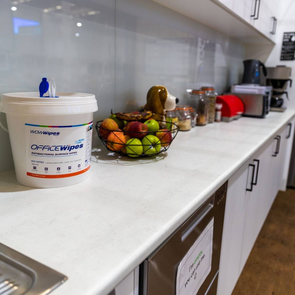 WOW Wipes® 6 Unexpected Places Where Wet Wipes Save Time white bucket of wet wipes sitting on a kitchen counter